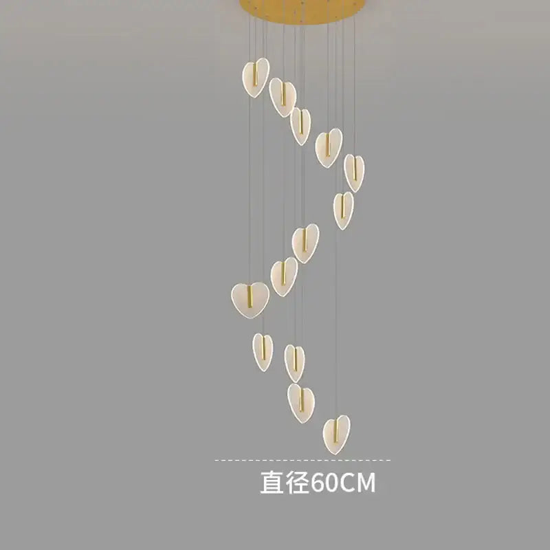 A modern decorbites love chandelier with white heart-shaped lights and gold crystal mount for staircase and living room lighting