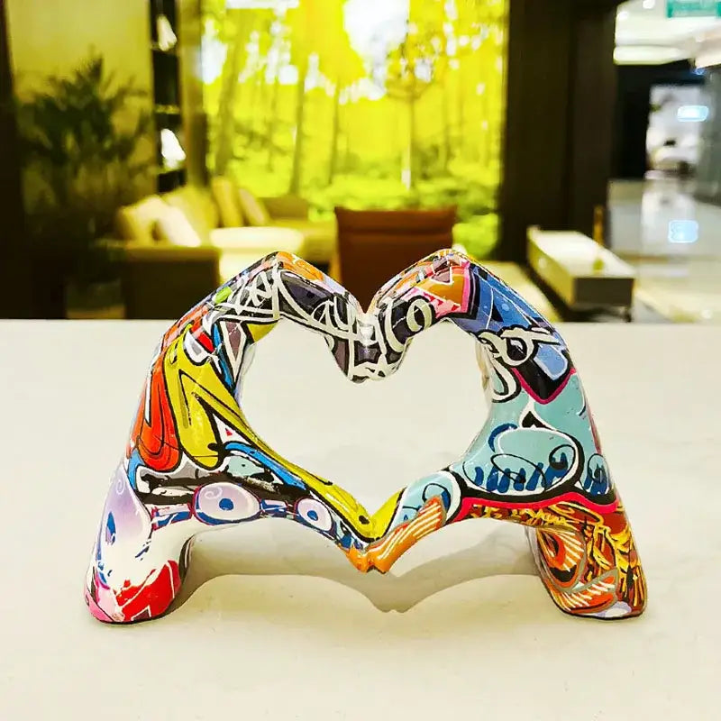 Vibrant decorbites love gesture sculptures heart hand pop art figurine with glossy finish and bold colorful patterns