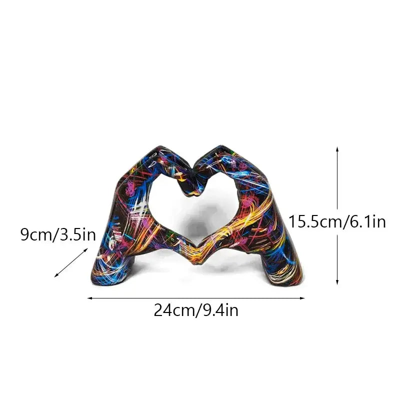 Vibrant abstractly painted resin love gesture sculptures by decorbites featuring two hands forming a heart shape