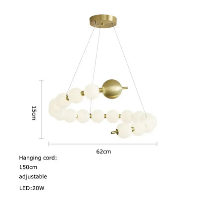 A decorbites love gold chrome chandelier featuring brass finish and frosted glass spheres in an asymmetrical spiral design
