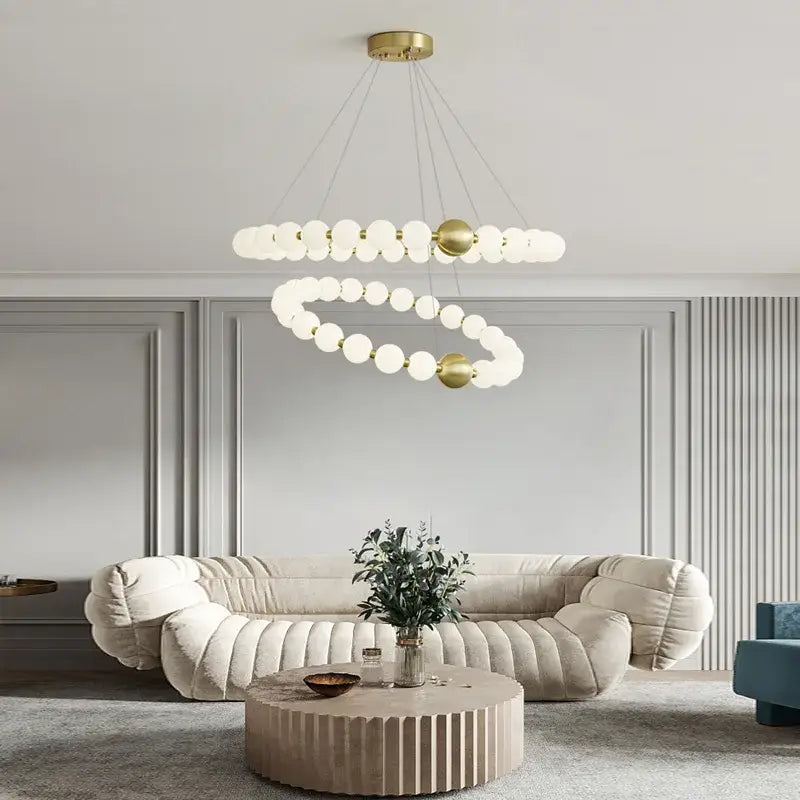Decorbites love gold chrome chandelier featuring a gold-toned spiral frame with frosted glass globe bulbs for dining room