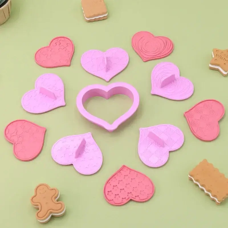 Set of pink and light purple decorbites love heart biscuit cutters with textured patterns for valentine’s day baking