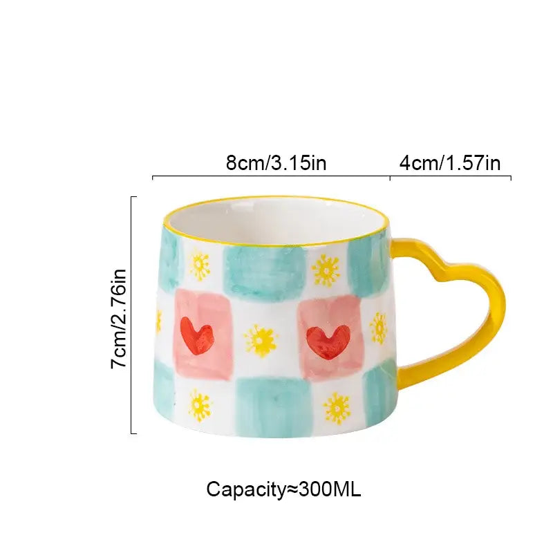 A decorbites love heart ceramic mug with a pastel checkered pattern and yellow heart-shaped handle for valentines gift
