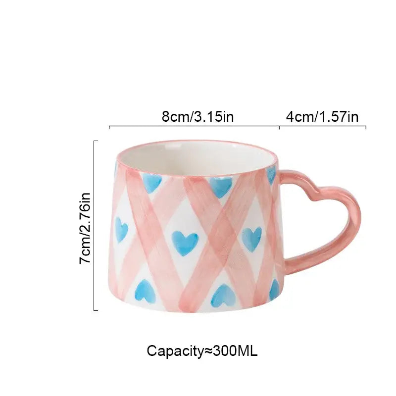 DecorBites love heart ceramic mug with pink and blue heart patterns and a matching heart-shaped handle for Valentine’s Day