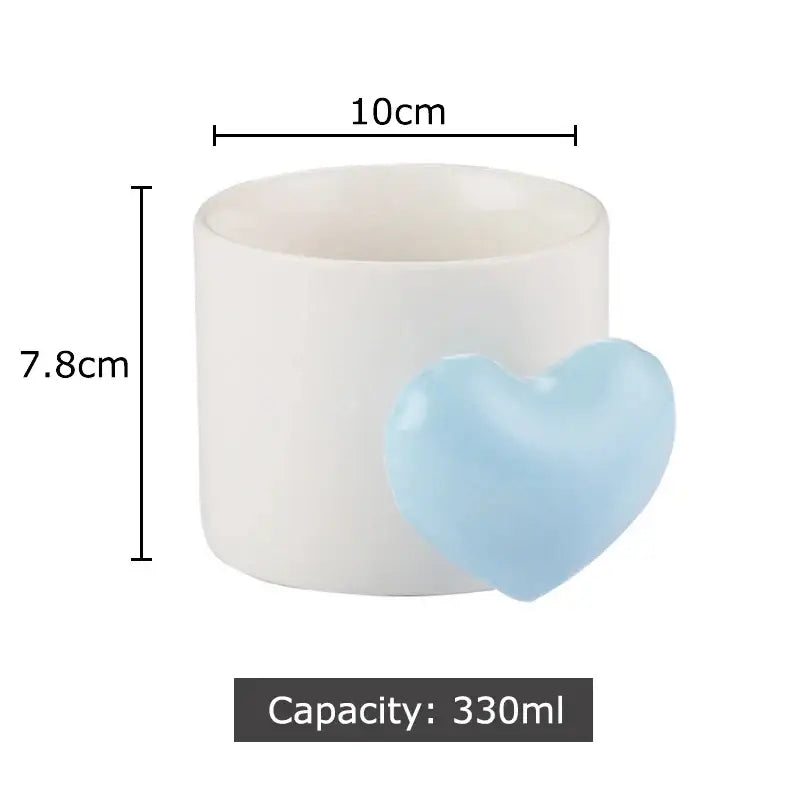 White ceramic mug with a light blue love heart ceramic accent from DecorBites™ love heart collection for coffee and tea