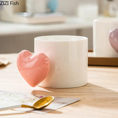 A white ceramic mug with a glossy pink love heart ceramic handle from decorbites dining coffee tea cup collection