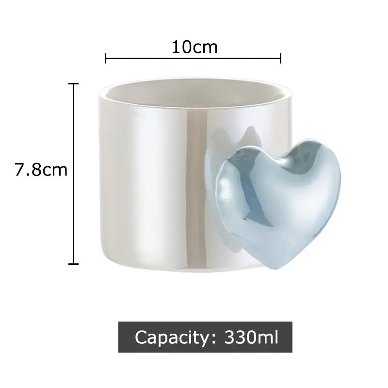 A sleek glossy white ceramic mug with a love heart ceramic handle for dining coffee tea juice use