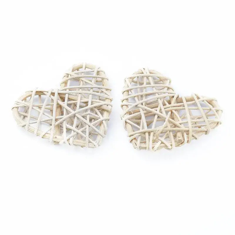 Two off-white woven rattan heart-shaped love heart decorations by decorbites love for weddings and scrapbooking