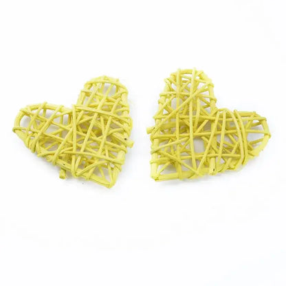 Two pale yellow woven heart decorations made from natural twigs decorbites love heart for wedding and valentines