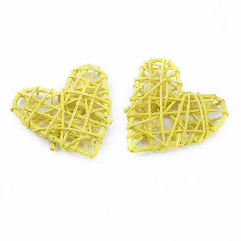 Two pale yellow woven heart decorations made from natural twigs decorbites love heart for wedding and valentines