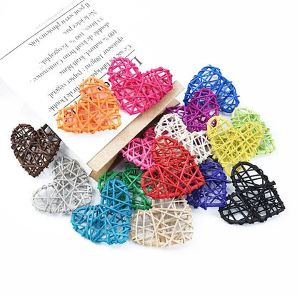 A collection of colorful woven love heart decorations made from natural plant fibers by decorbites love for weddings and scrapbooking