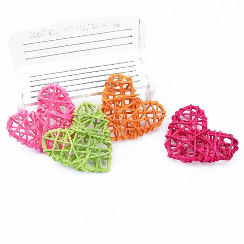 Colorful decorbites love heart decorations woven in pink green and orange for wedding valentines and scrapbooking use
