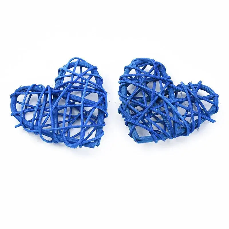 Two vibrant blue woven heart-shaped love heart decorations made from natural twine by decorbites love heart
