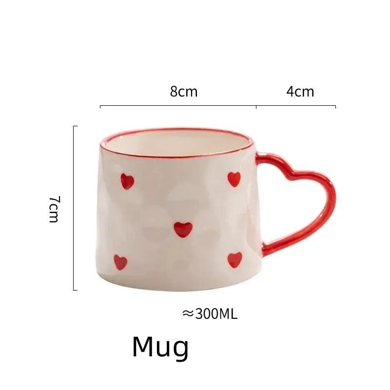 White ceramic mug with red heart decals and a decorbites love heart hand painted handle, 300ml capacity for home office use