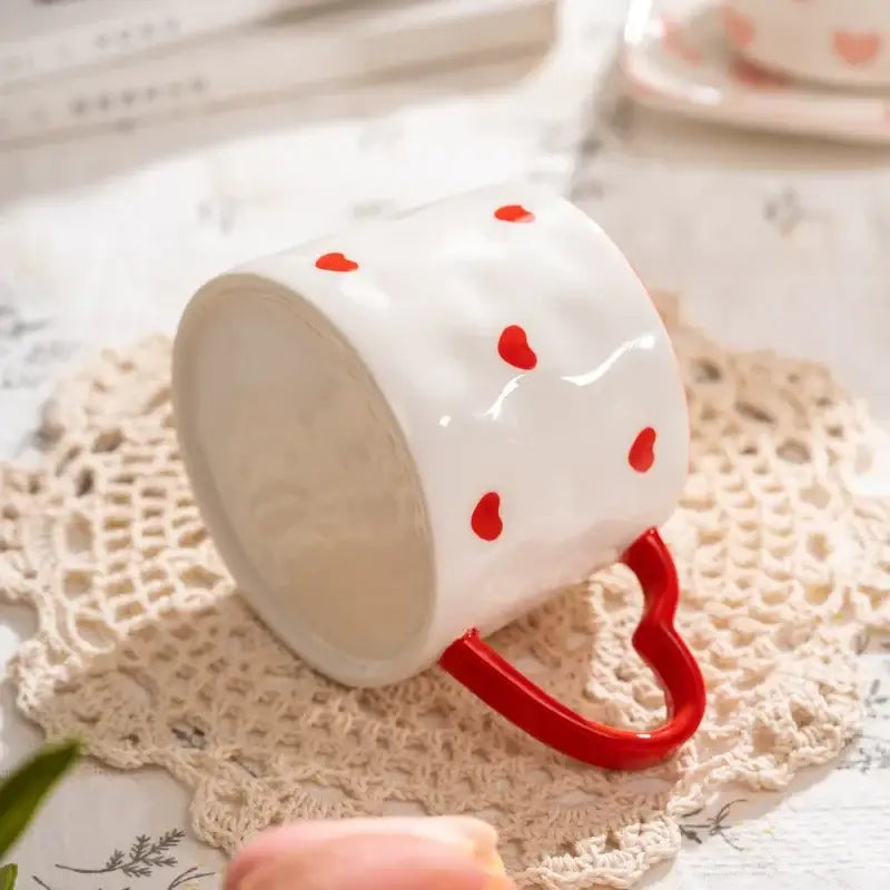 White ceramic mug with red love heart hand painted handle and scattered heart decals by decorbites love heart
