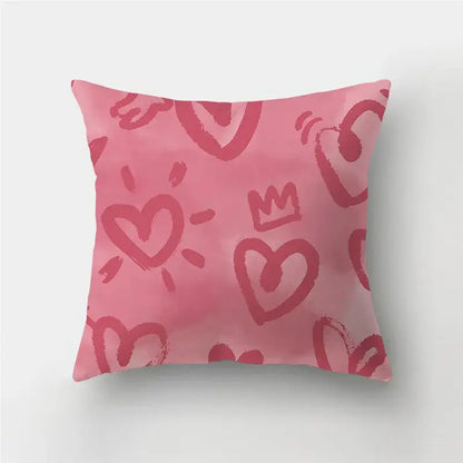 Pink throw pillow cover with playful love heart print and crown pattern in shades of pink for home decor sofa use