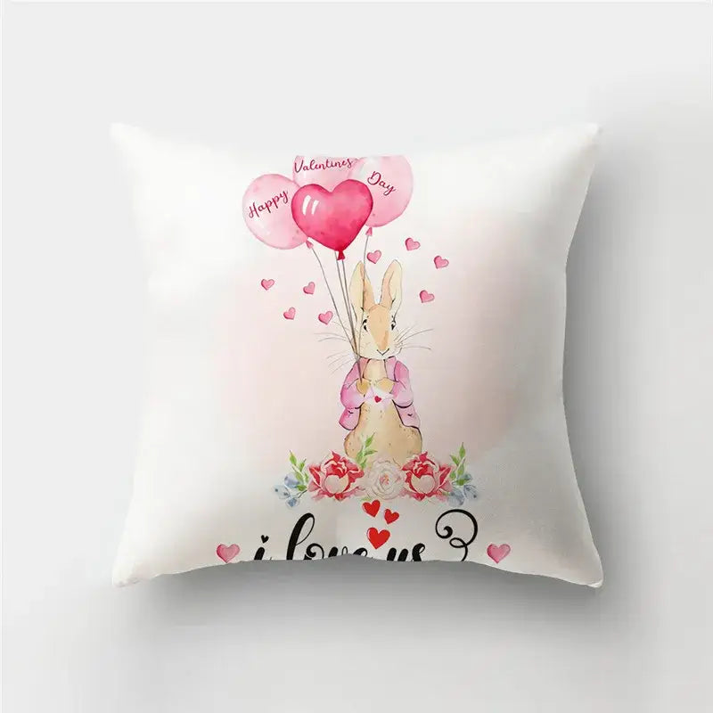 White throw pillow cover with love heart print featuring a beige rabbit holding balloons and floral design for home decor