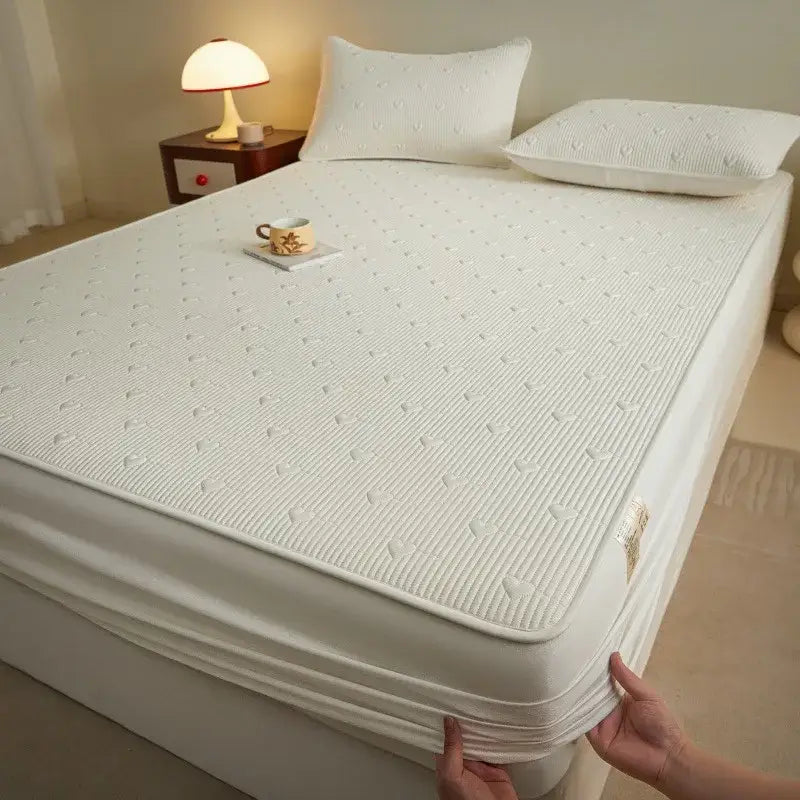 White textured mattress protector with quilted pattern and elastic edges for decorbites love pattern cotton fitted sheet