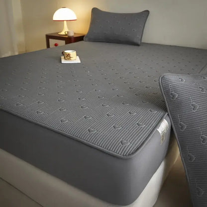 Gray heart-patterned decorated fitted sheet with quilted texture and elastic edge from decorbites love pattern cotton collection