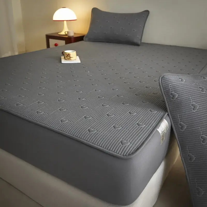 Gray heart-patterned decorated fitted sheet with quilted texture and elastic edge from decorbites love pattern cotton collection