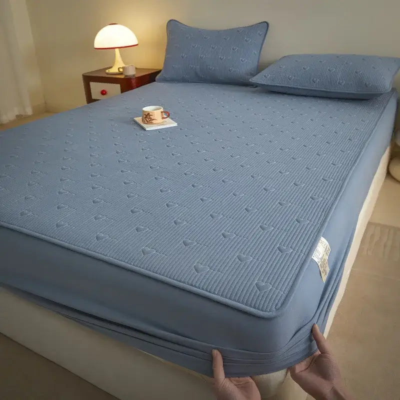 Light blue quilted decorbites love pattern cotton fitted sheet single with subtle heart pattern and ribbed texture