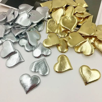 Shiny metallic silver and gold heart-shaped embellishments with textured fabric on decorbites love petal peach heart bouquet