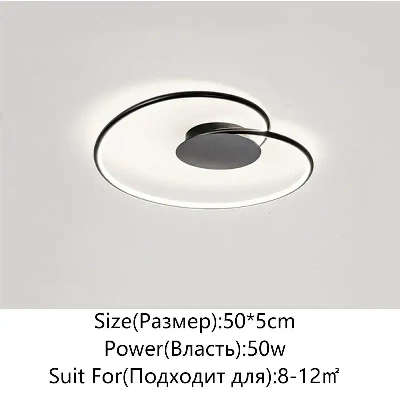 Modern black circular led ceiling light with sleek minimalist design by DecorBites love shaped for bedroom and living room