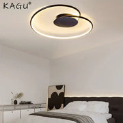 Modern decorbites love shaped ceiling light with sleek black and gold finish and illuminated ring design for versatile use