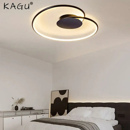 Modern decorbites love shaped ceiling light with sleek black and gold finish and illuminated ring design for versatile use