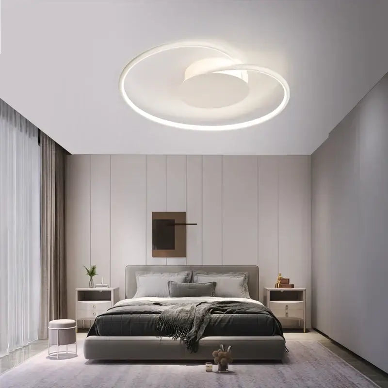 Modern white circular ceiling light with sleek minimalist design from decorbites love shaped ceiling series for bedroom and living room
