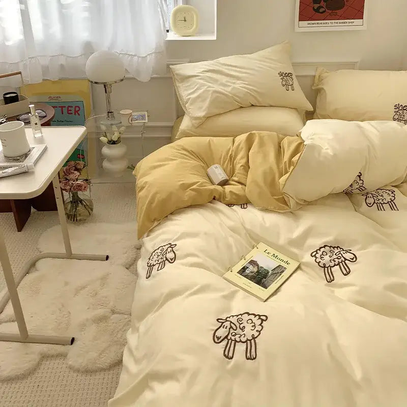 Cream-colored DecorBites™ Lovely Bear & Sheep embroidered bedding set featuring sheep embroidered bedding designs