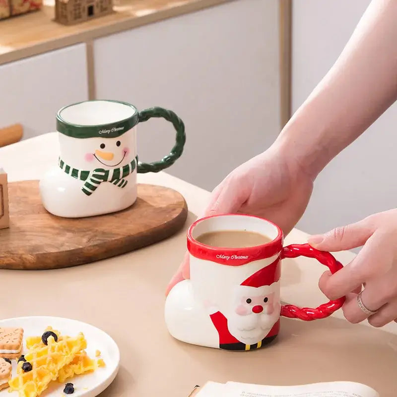 White ceramic mug shaped like a santa boot with red trim and smiling face for decorbites lovely christmas socks gift