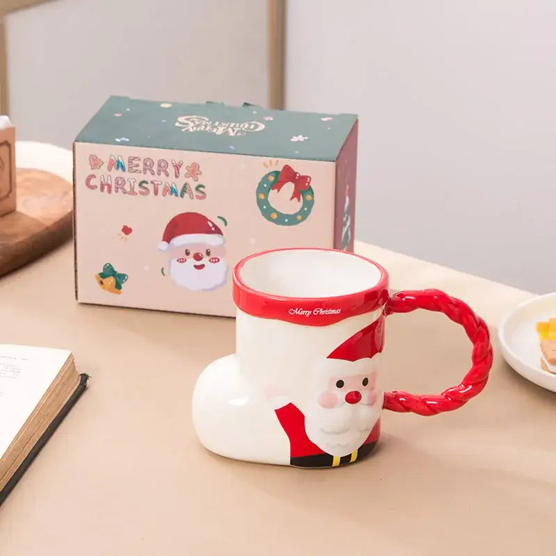 White ceramic mug shaped like a santa claus boot with red trim and festive design decorbites lovely christmas socks ceramic
