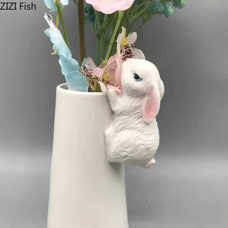 White ceramic vase with a cute sculpted bunny figurine side detail by DecorBites lovely rabbit ceramic for decor