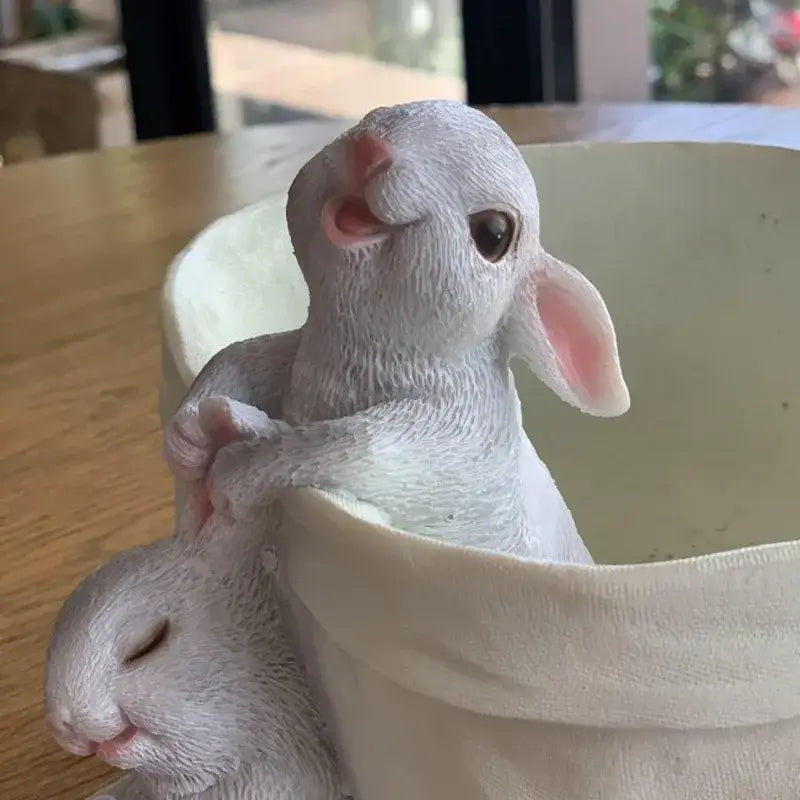 White resin lovely rabbit garden figurines with pink ears on a ceramic rabbit garden flowerpot for balcony decor