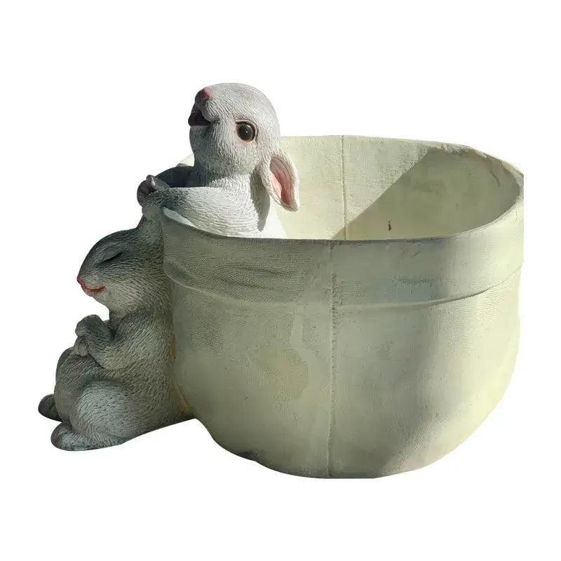 A charming gray resin lovely rabbit garden flowerpot featuring two intricately sculpted rabbits for balcony decor