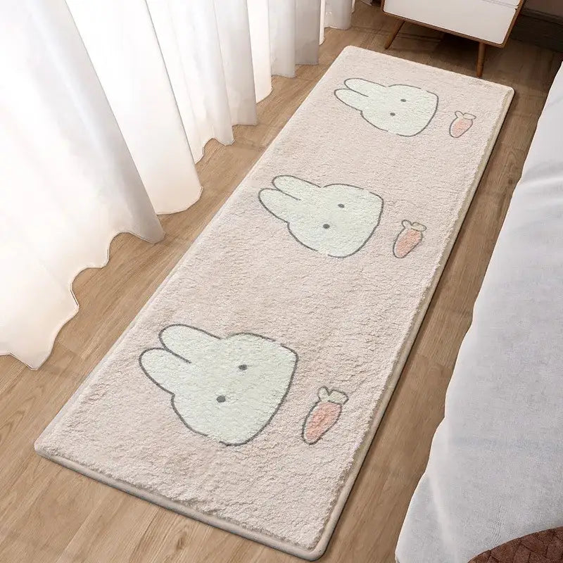 A cream-colored plush decorbites lovely rabbit pink bedside rug for girls featuring repeating cartoon bunny faces with carrots