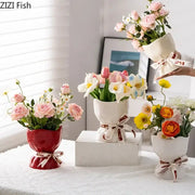 White ceramic flower vase with a ribbon bow base from DecorBites lovely ribbon ceramic vase set for cute room aesthetic decor