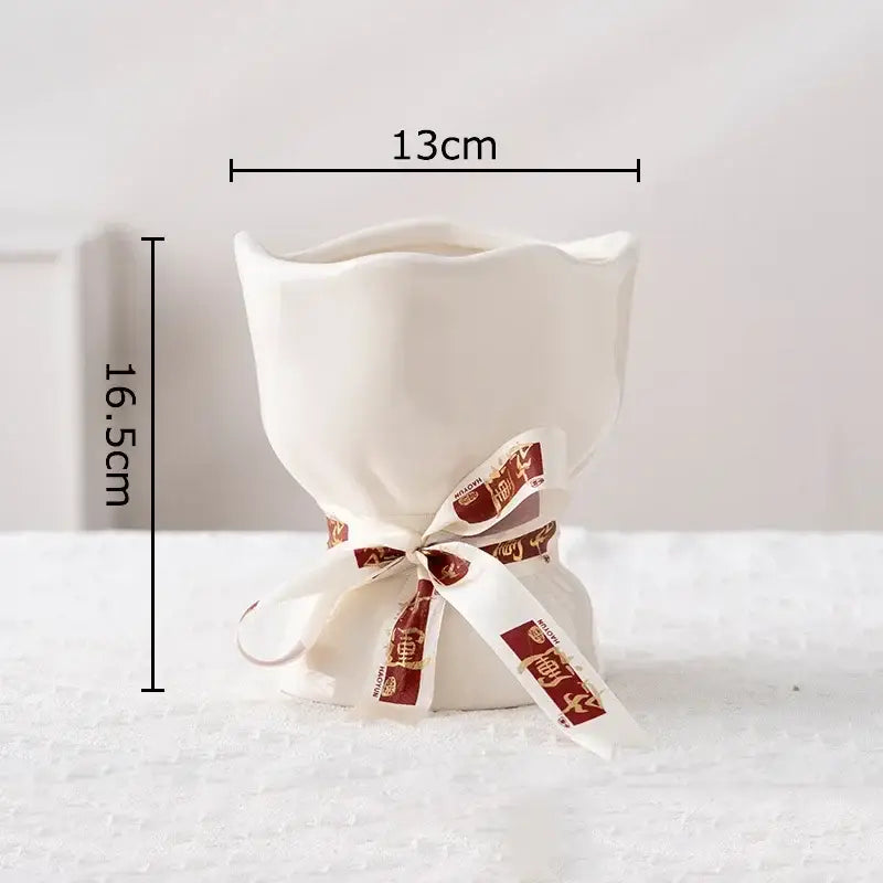 White ceramic fluted vase from decorbites lovely ribbon ceramic vase set with red and white decorative ribbon at base