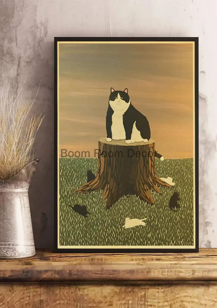 Black and white illustrated cat paper poster in black frame showing a seated cat on a tree stump for home decor