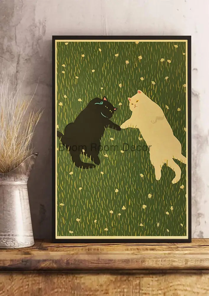 A framed decorbites™ cat paper poster featuring a black and cream-colored cat playing in grass with yellow flowers