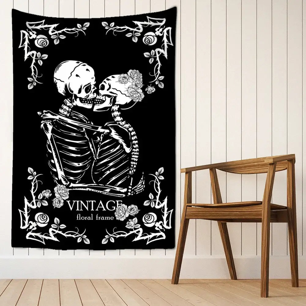 Black decorbites lovers skull tapestry wall hanging featuring white romantic skeleton couple with floral vine border