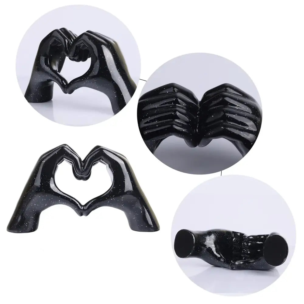 Black glitter-finished ceramic decorbites loving gesture heart sculpture of two hands forming a loving gesture heart shape