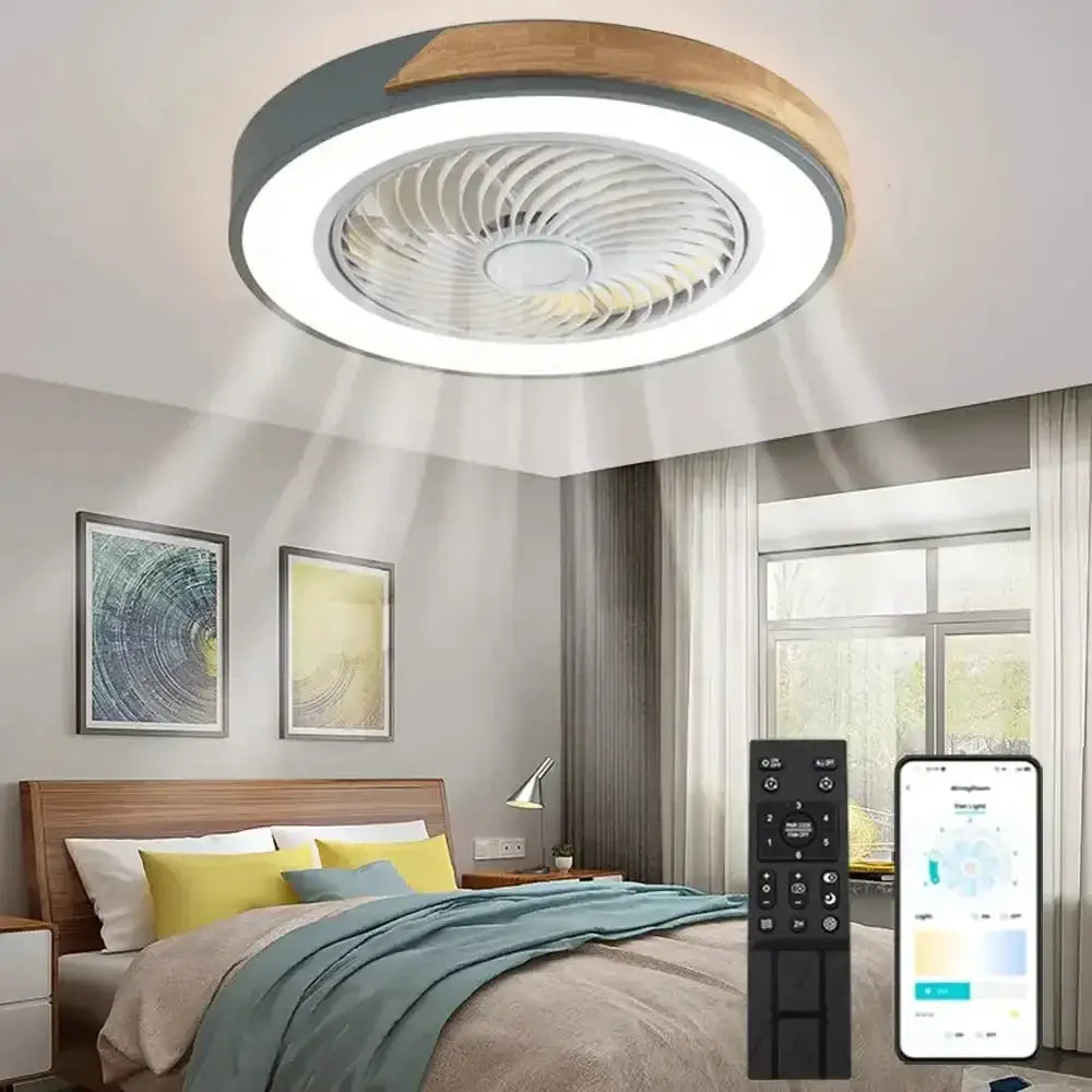 Modern circular decorbites low profile ceiling fan with remote control featuring gray and wood accents and integrated led light