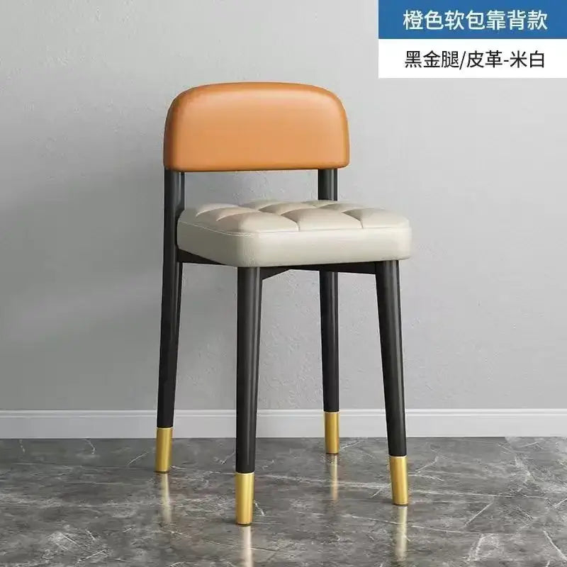 Decorbites low square stool bench with tan leather backrest tufted off-white seat and black legs with gold caps