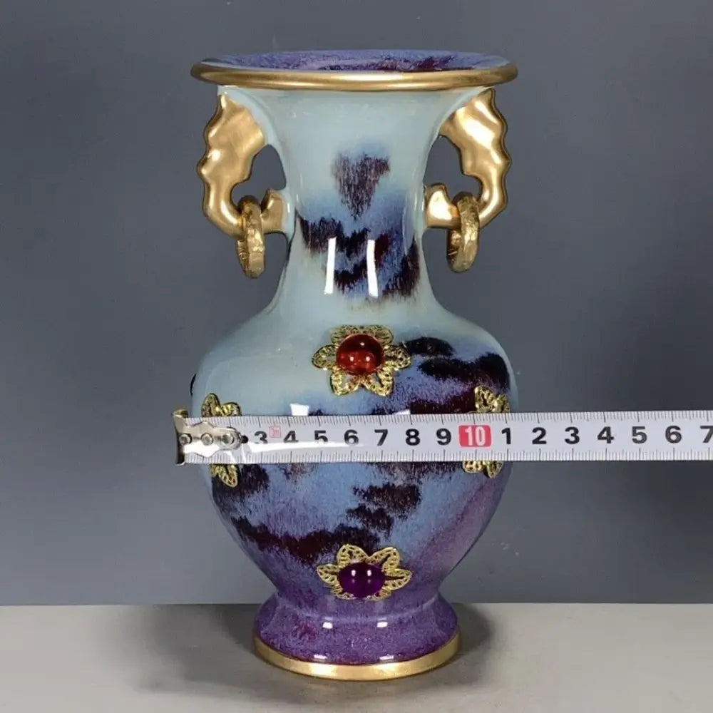 A qinzhai jun porcelain bottle ornament with gradient blue purple glaze gold handles and gem inlaid floral embellishments