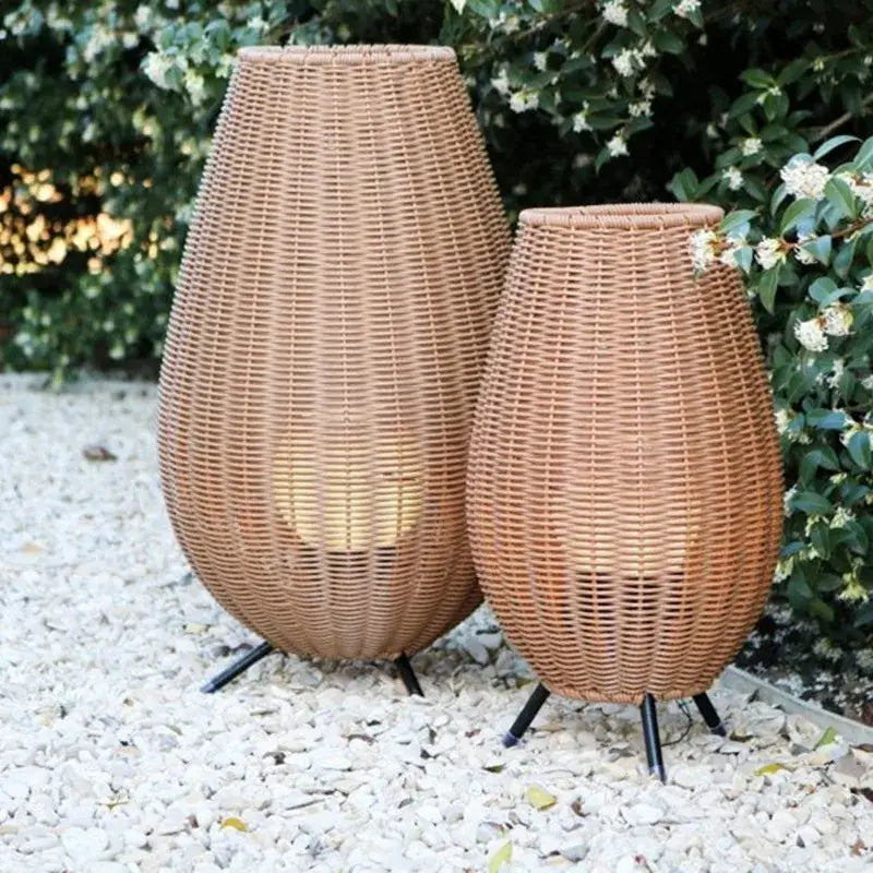 Tall tan wicker decorbites lucide colin rattan floor lamp with black metal legs for garden and living room use