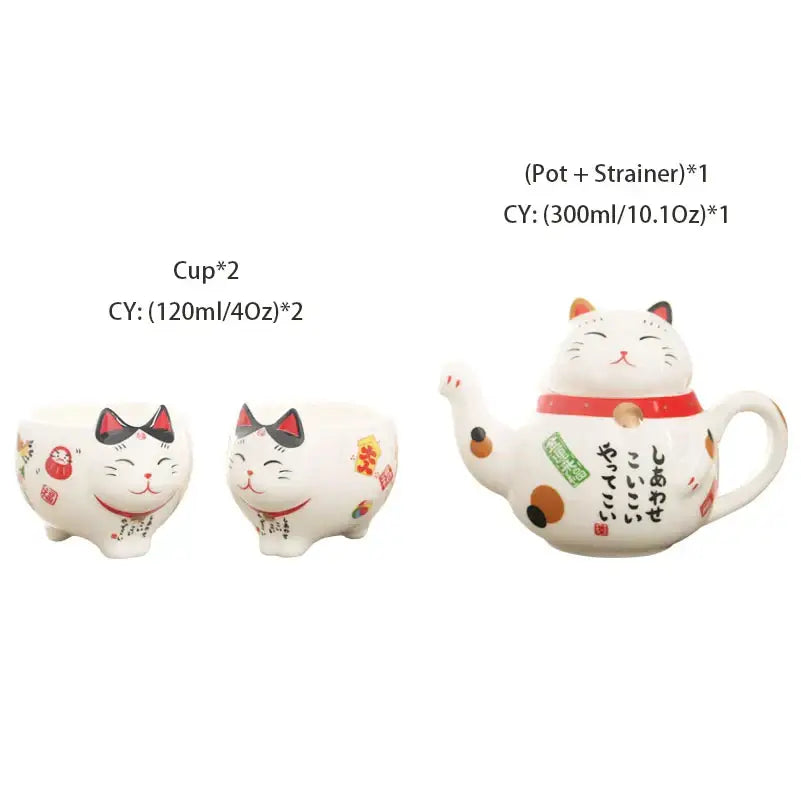 White ceramic teapot shaped like a smiling cat with red collar black accents japanese characters and orange polka dots from decorbites lucky cat porcelain tea set