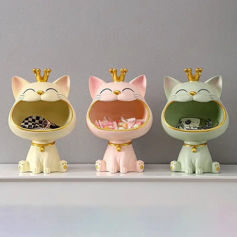 Two ceramic lucky cat sculpture storage boxes in mint green and cream with gold crowns for desk decoration