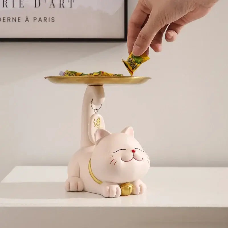 White ceramic decorbites lucky cat statue with gold accents and a golden plate on its back for home decor and storage